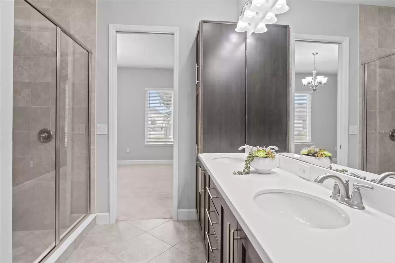 Primary Bath with Dual Sinks and Shower Stall