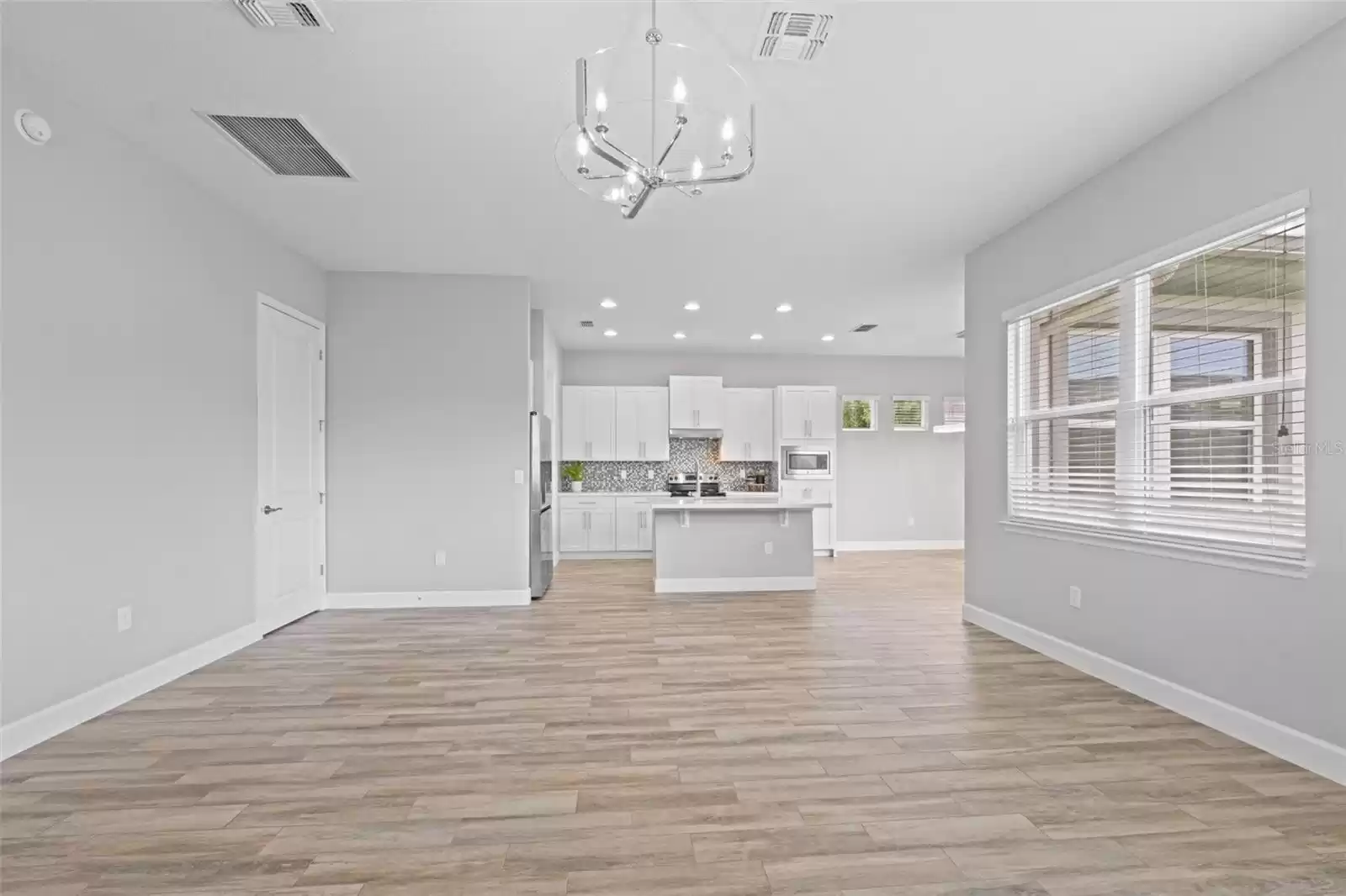 Open Concept Living Room, Kitchen and Dining. Natural Light.