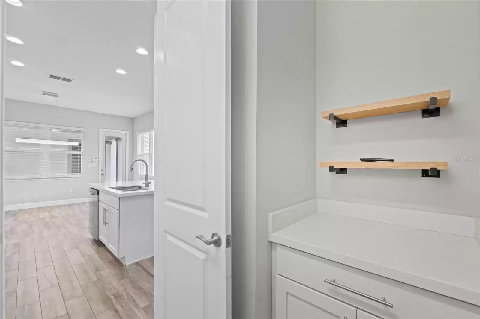 Laundry Room with Open Shelving.