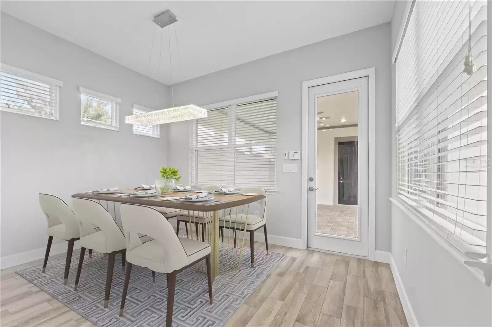 “Virtually Staged” Dining Room, Door to Lanai