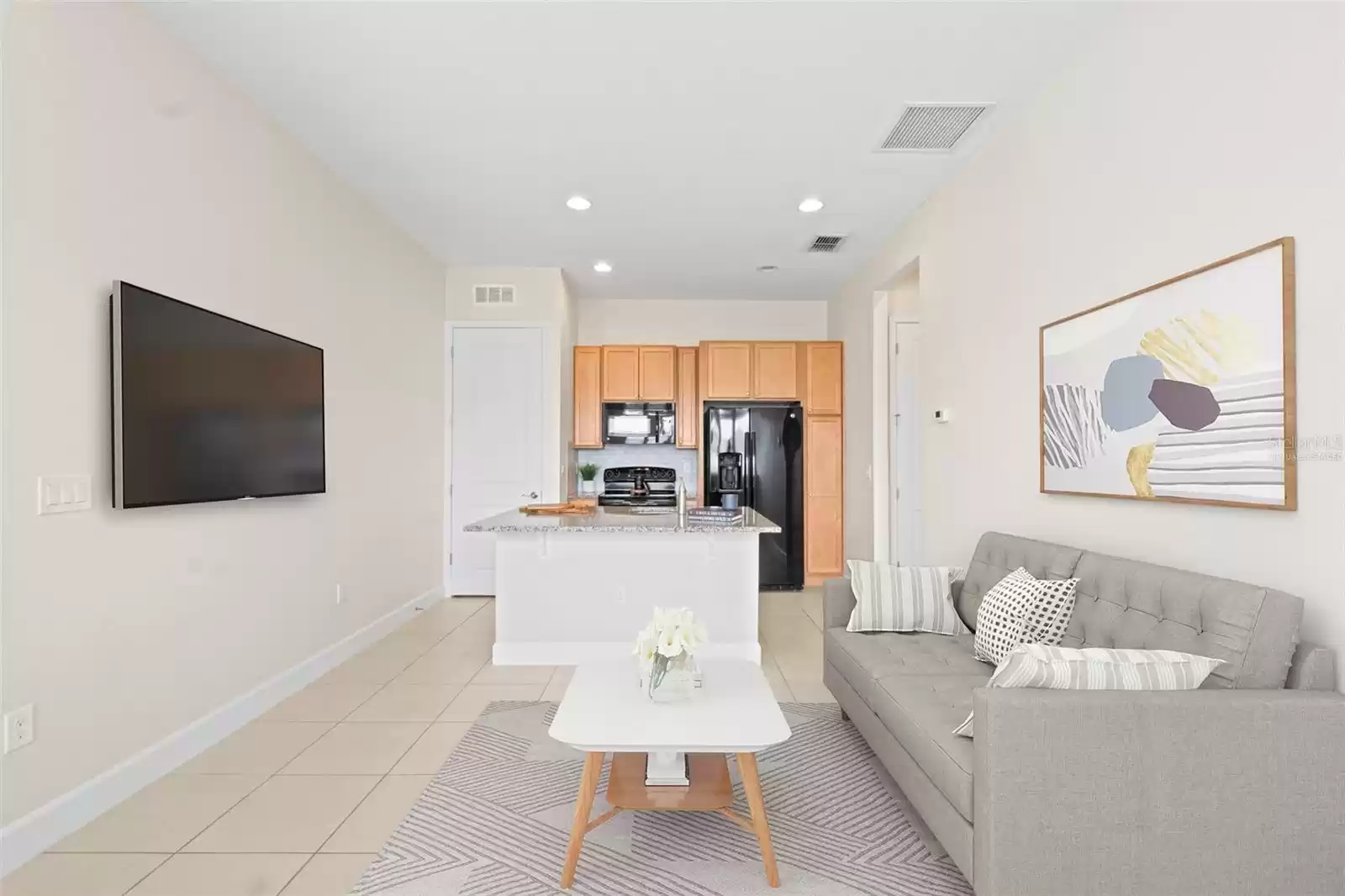 “Virtually Staged” Above Garage Apartment Living Room. ADU Living Room.