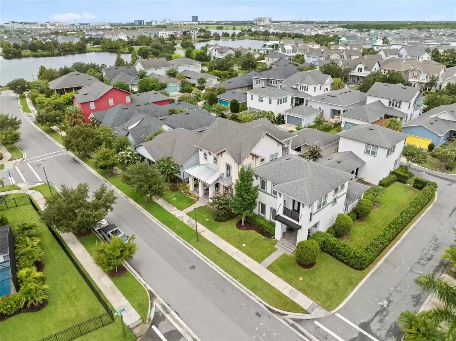 Aerial Shot Single Family Home with Detached Garage and Above Garage Apartment (ADU).