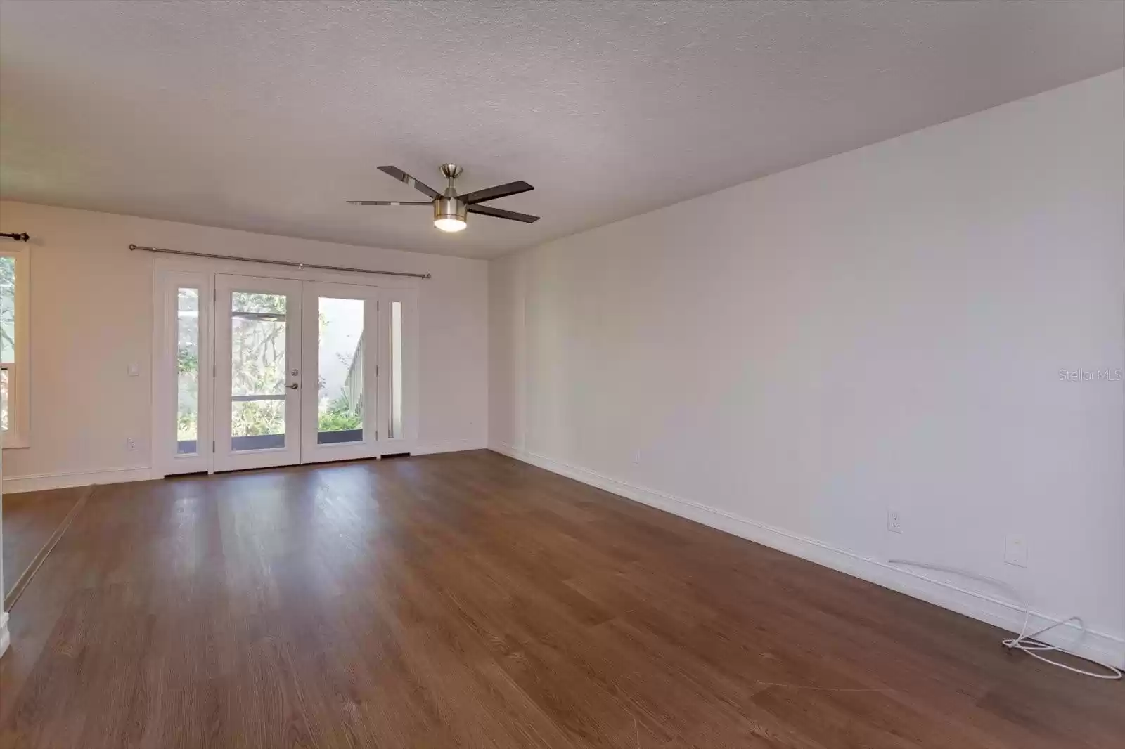 living room with french door access to screened porch