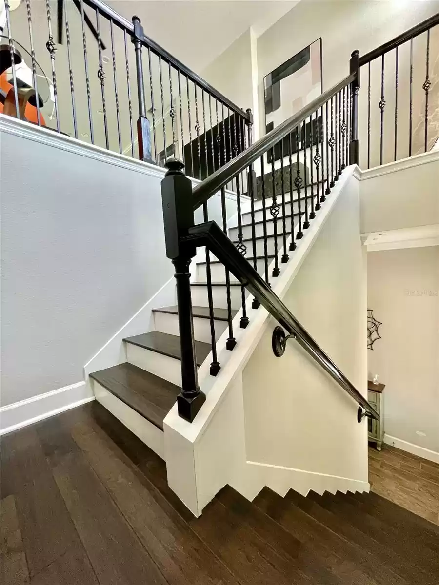 Wood flooring in stairwell.