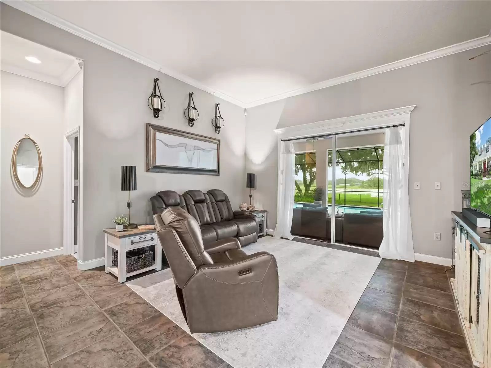 Formal Living Room with sliding glass door to lanai