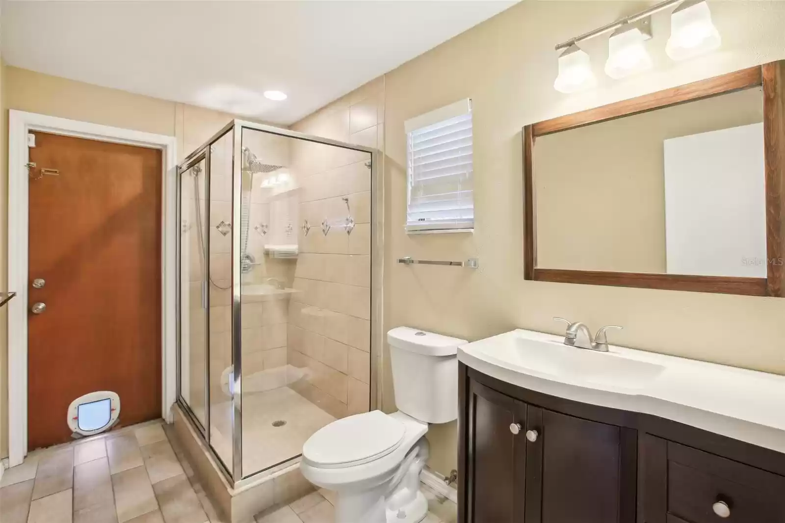 Rear bahroom #2 with entrance to back porch