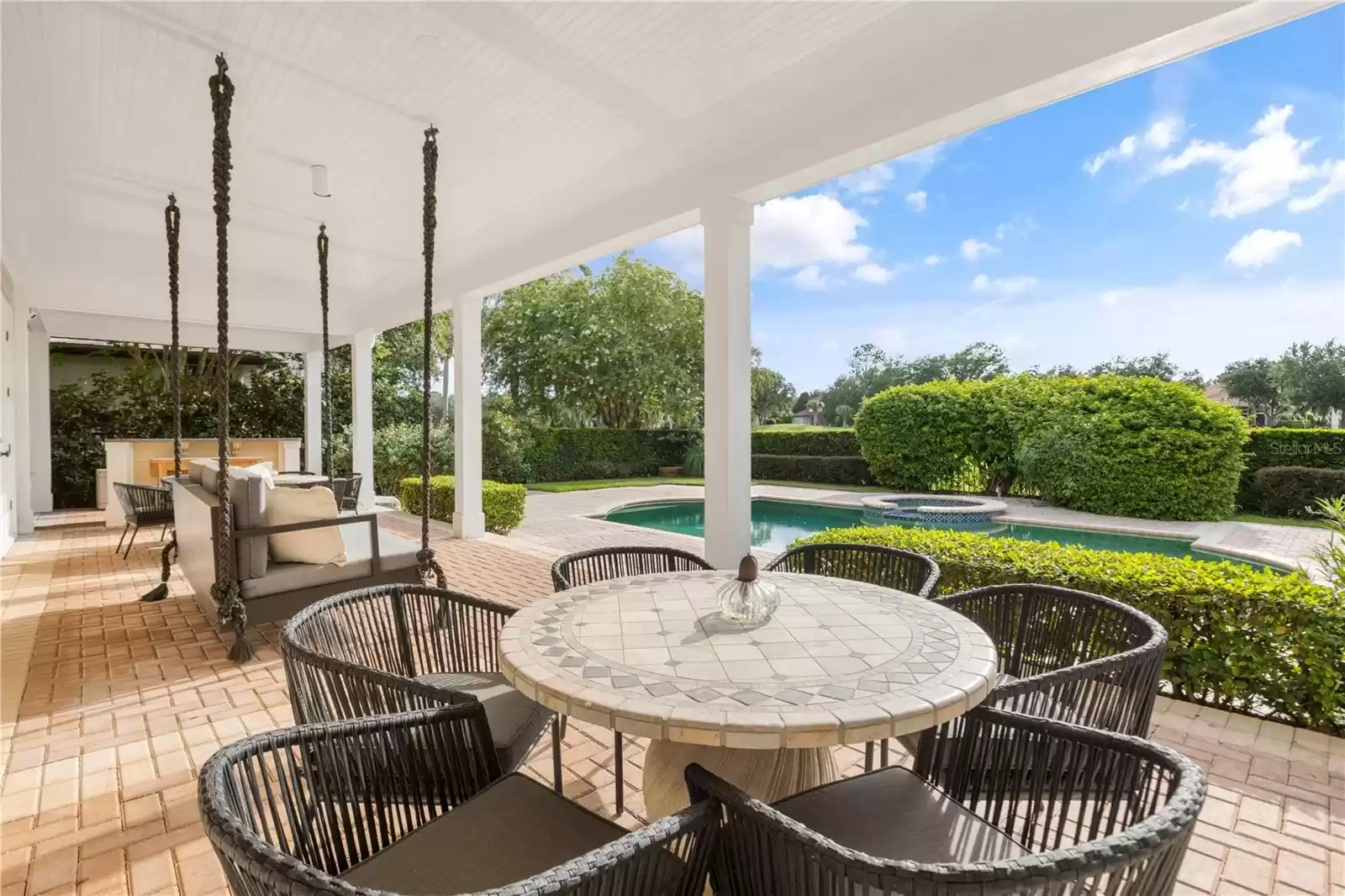 Large covered area with Summer Kitchen