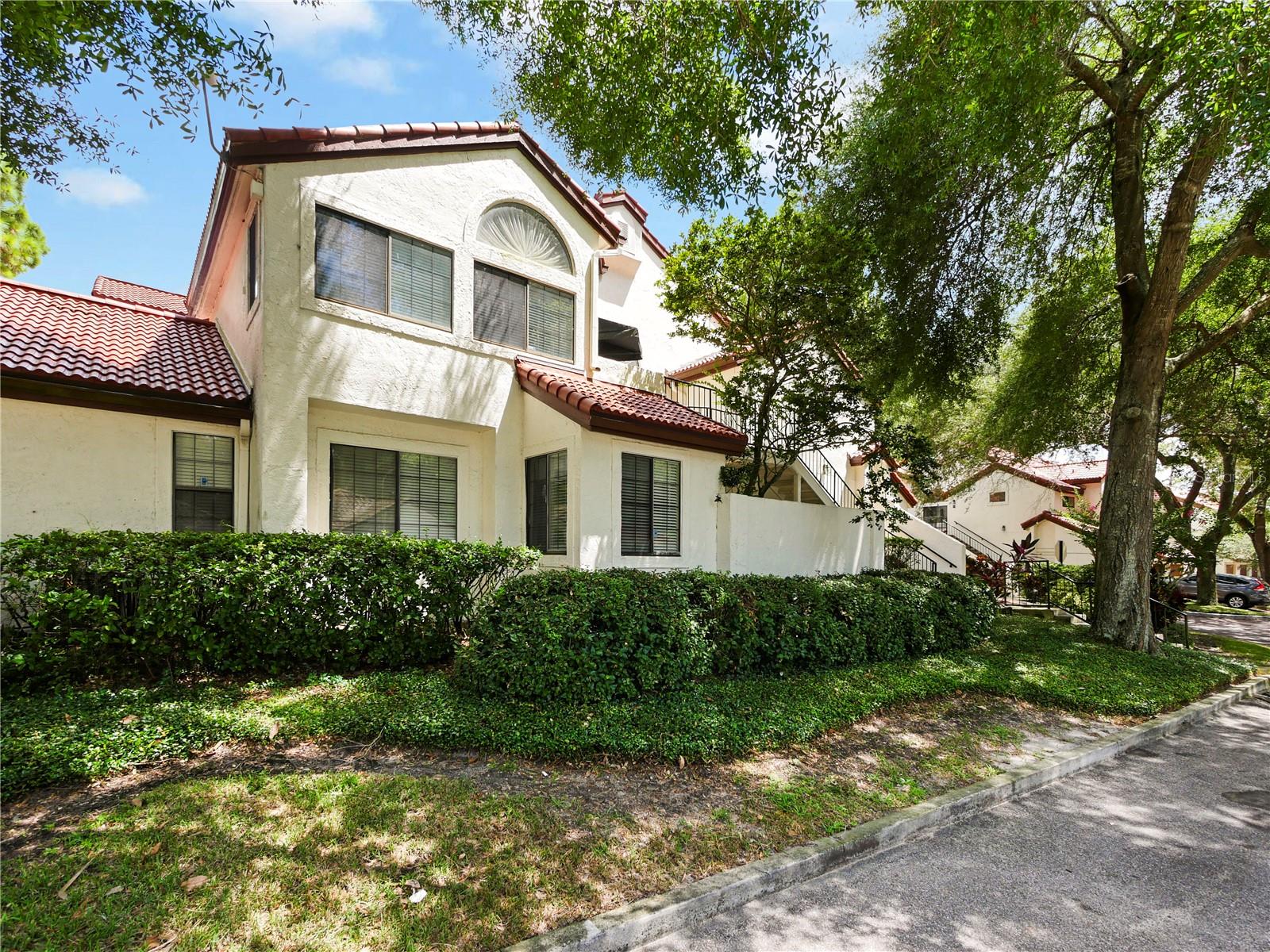 Mature natural landscaping, all maintained for you by condo. Idyllic.