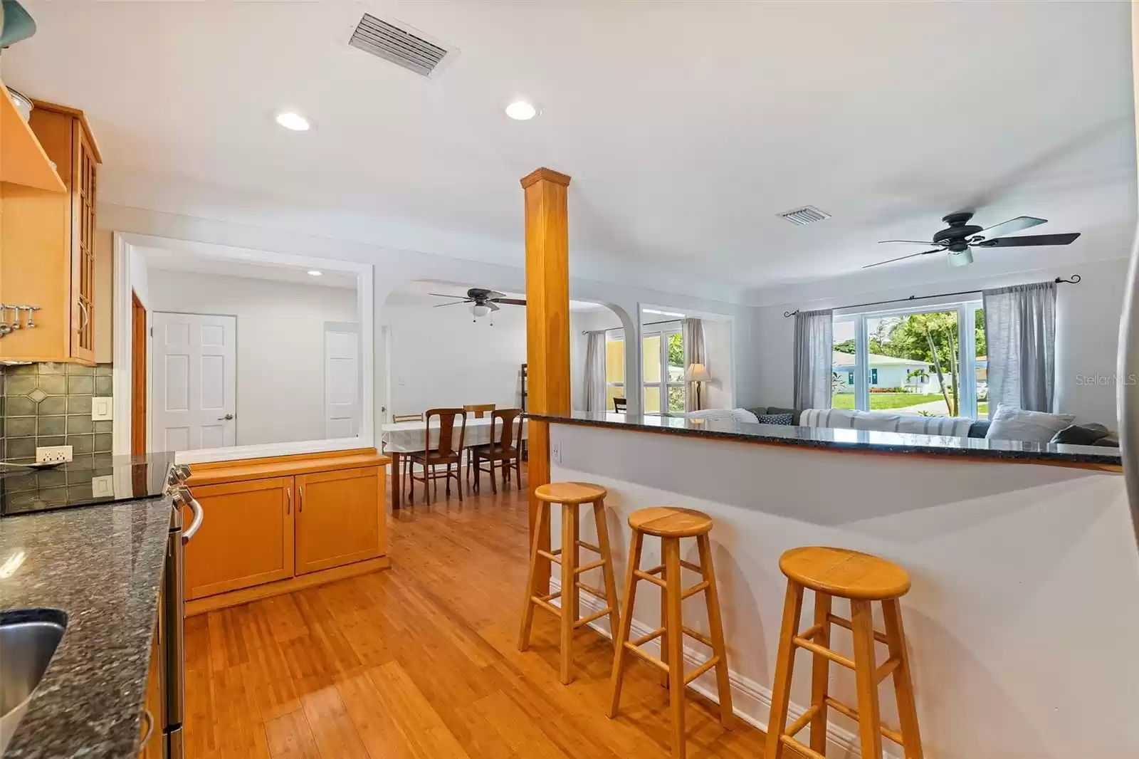 The kitchen opens up on 3 sides givng you a continuous open floor plan