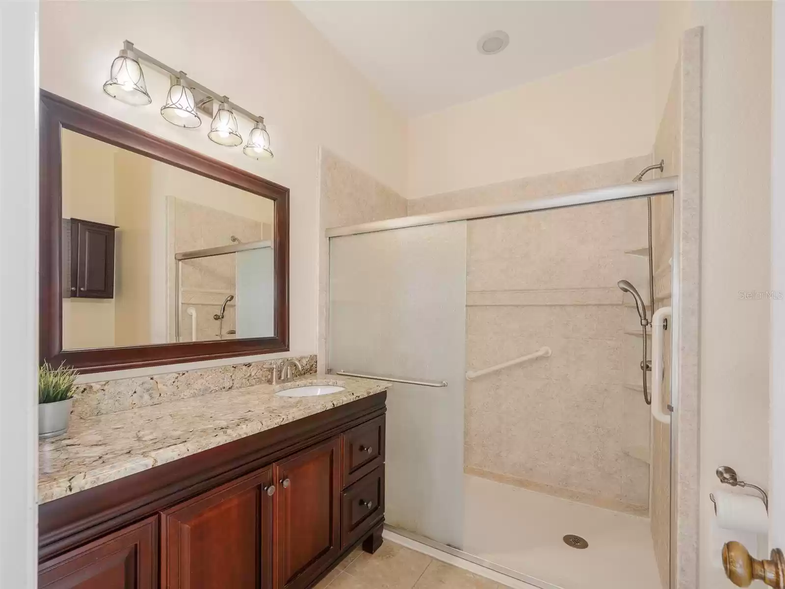 Primary bath with walk-in shower.