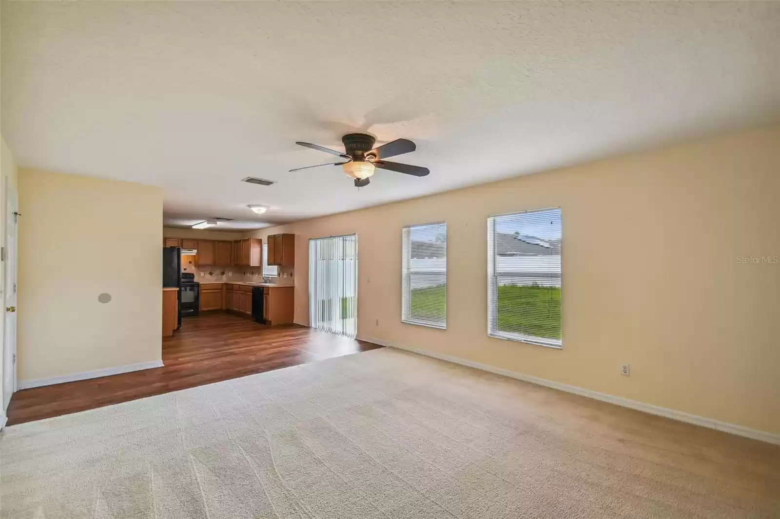 Family gathering area opens to kitchen and dining nook