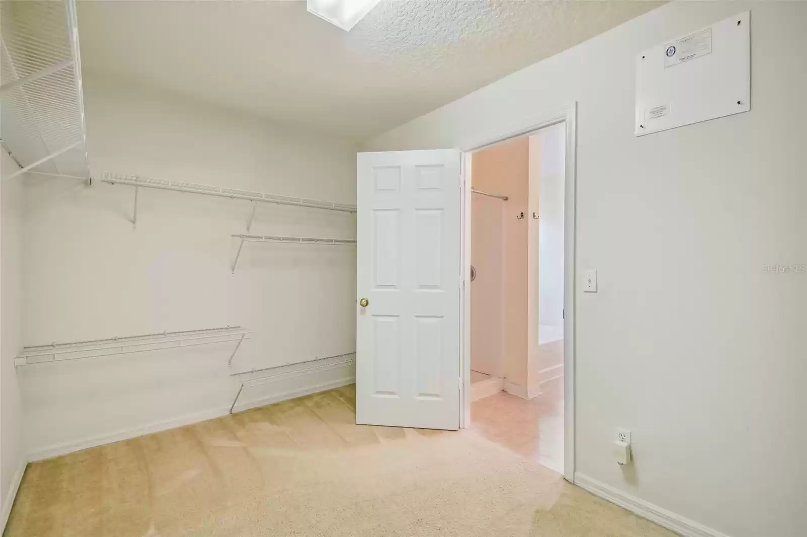 Primary walk-in closet