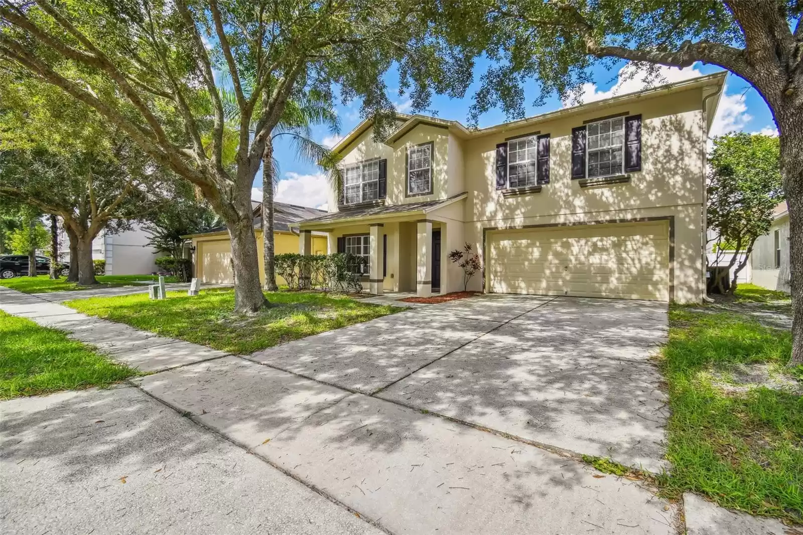 Two car garage and driveway offer plenty of parking