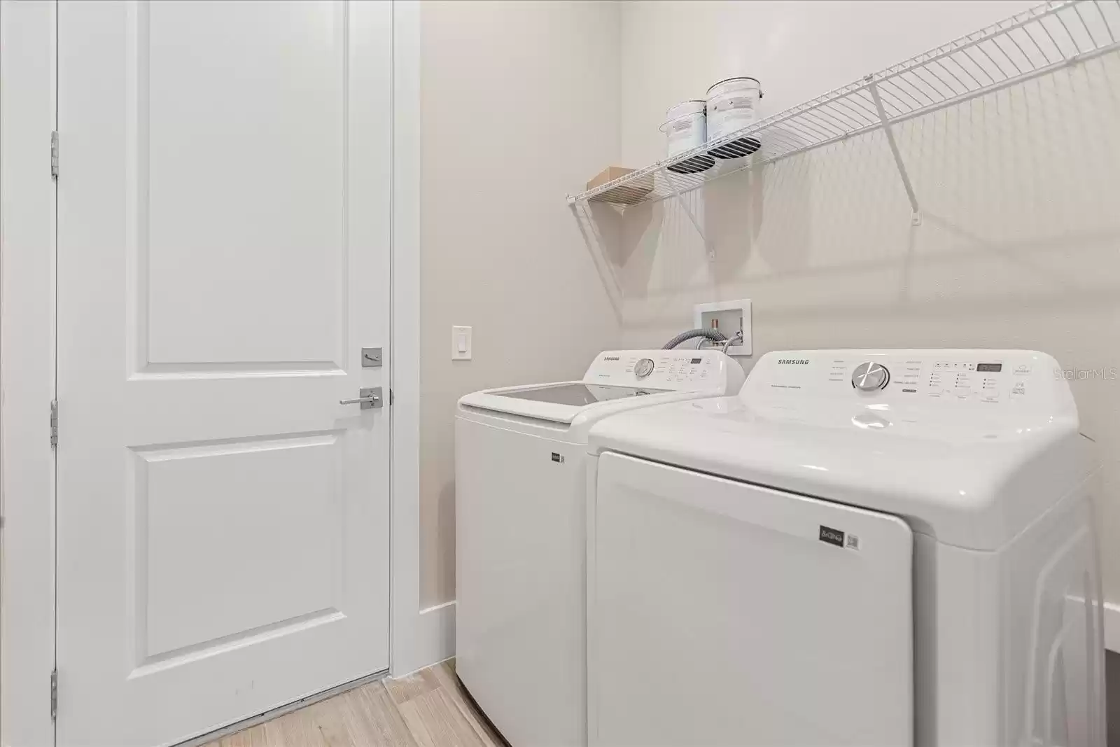 LAUNDRY ROOM OFF OF GARAGE