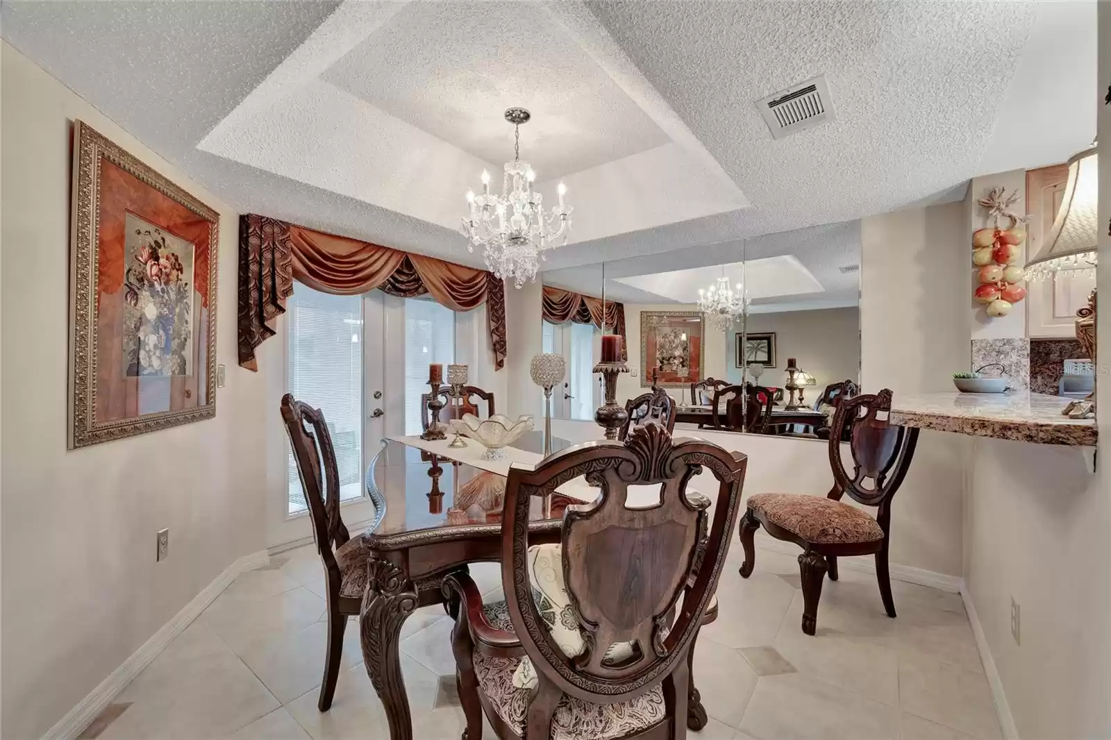 Dining room located between kitchen and living room for easy entertaining