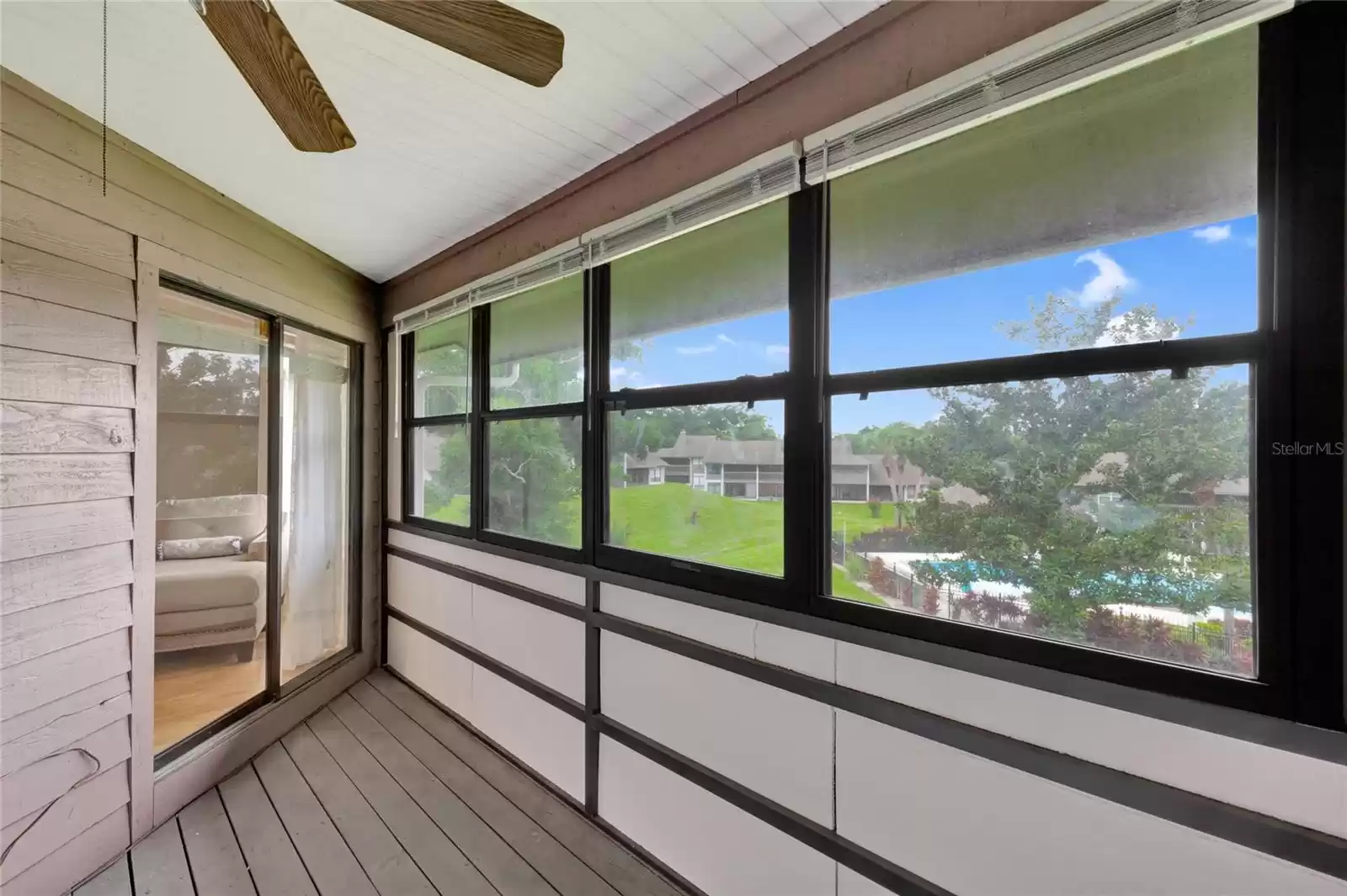 Private enclosed balcony off of primary bedroom