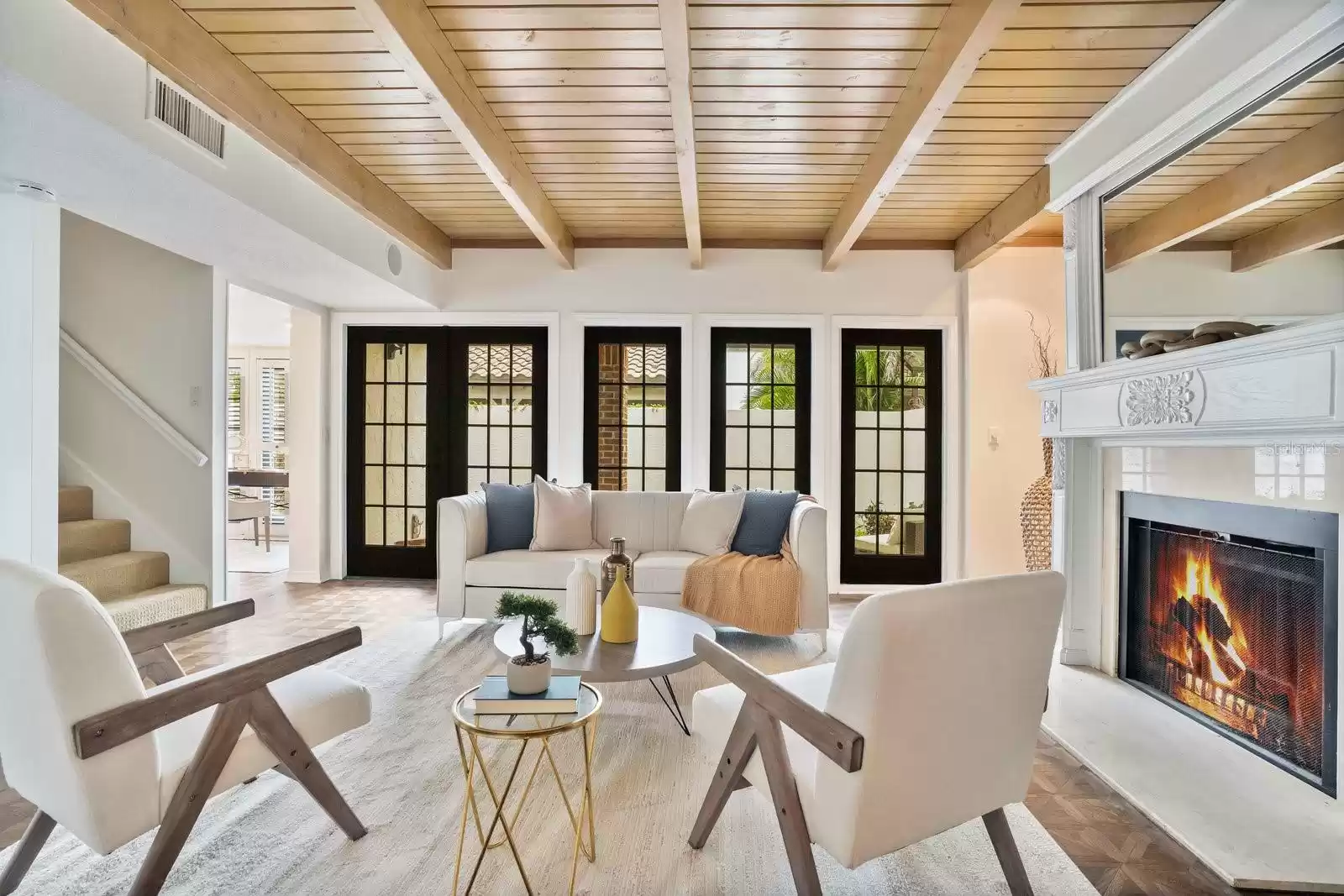 tongue and groove ceiling and wood burning fireplace