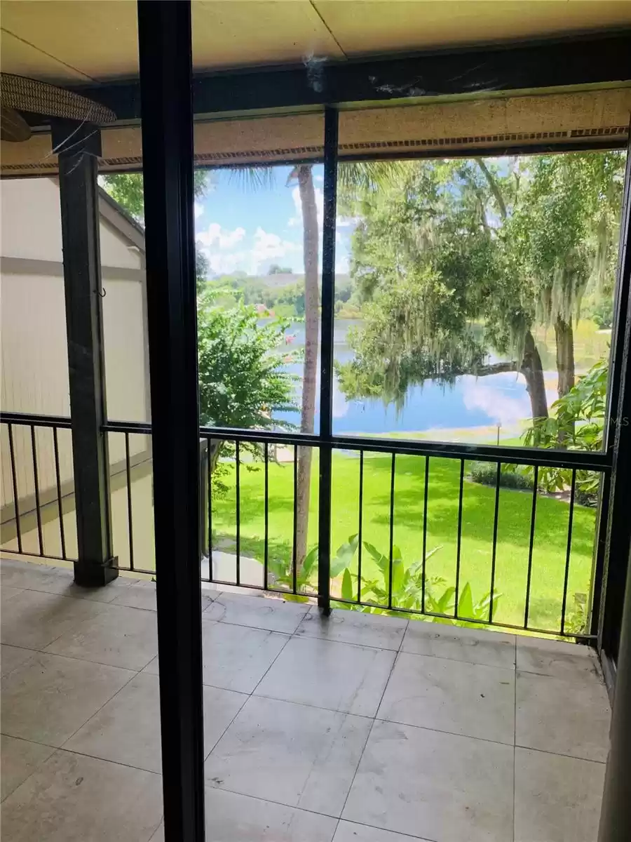 tile and screened patio overlooking lake