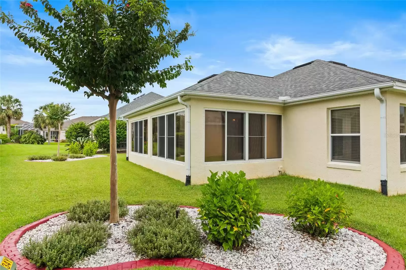 Fresh landscaping in the front and back of home