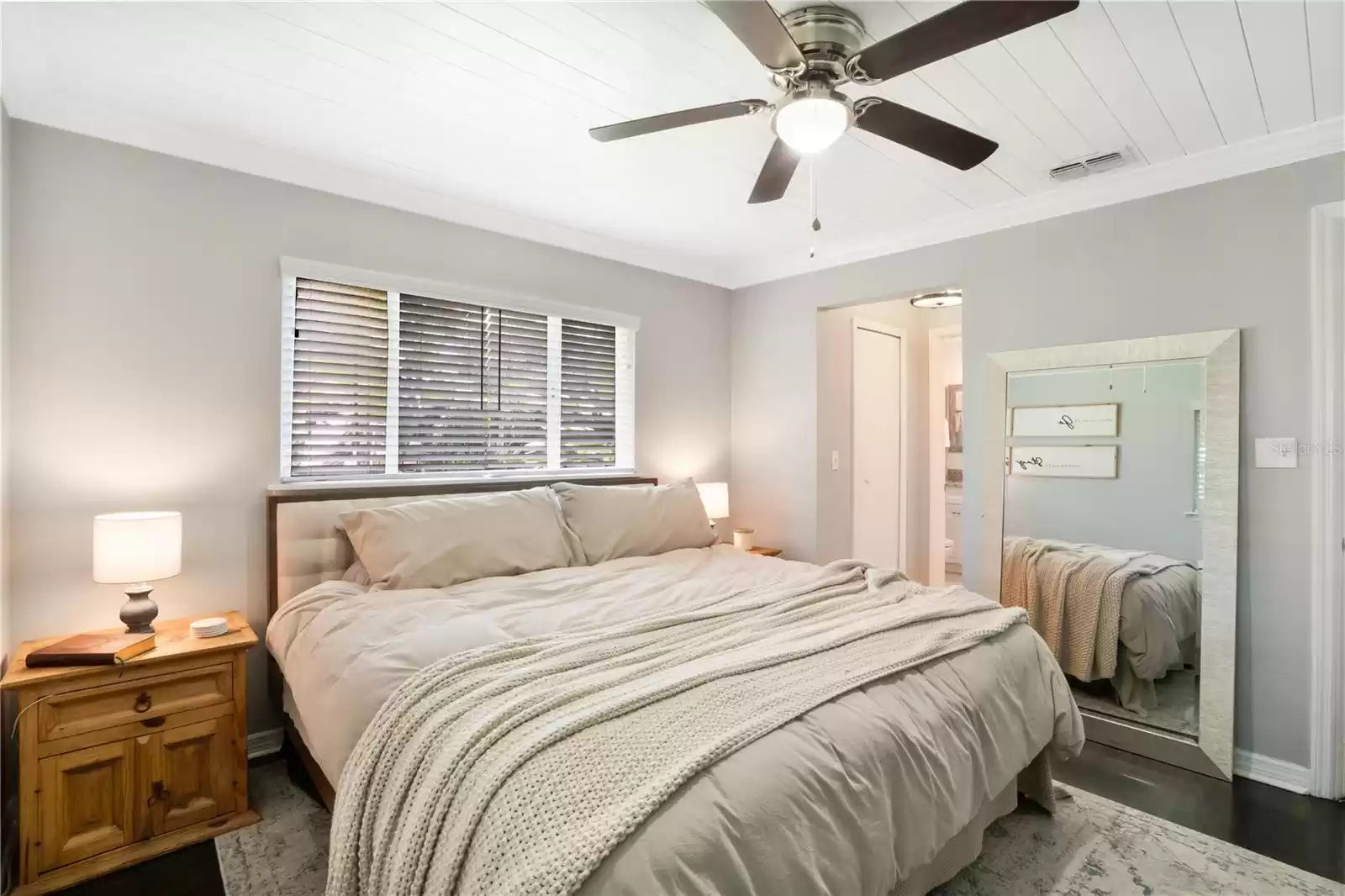 Primary Bedroom with Dual closets leading into Primary Bathroom