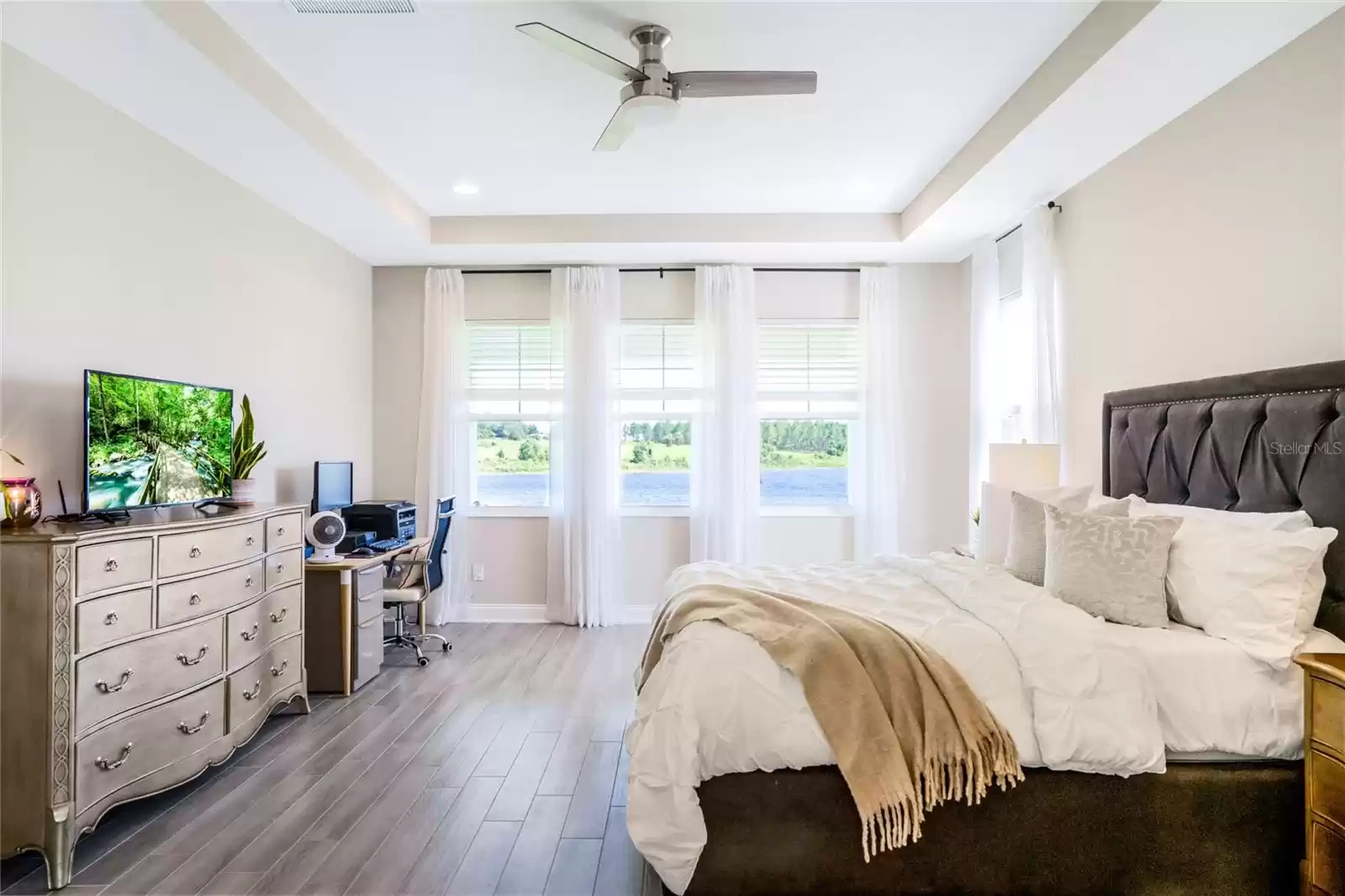 Primary bedroom with lake views