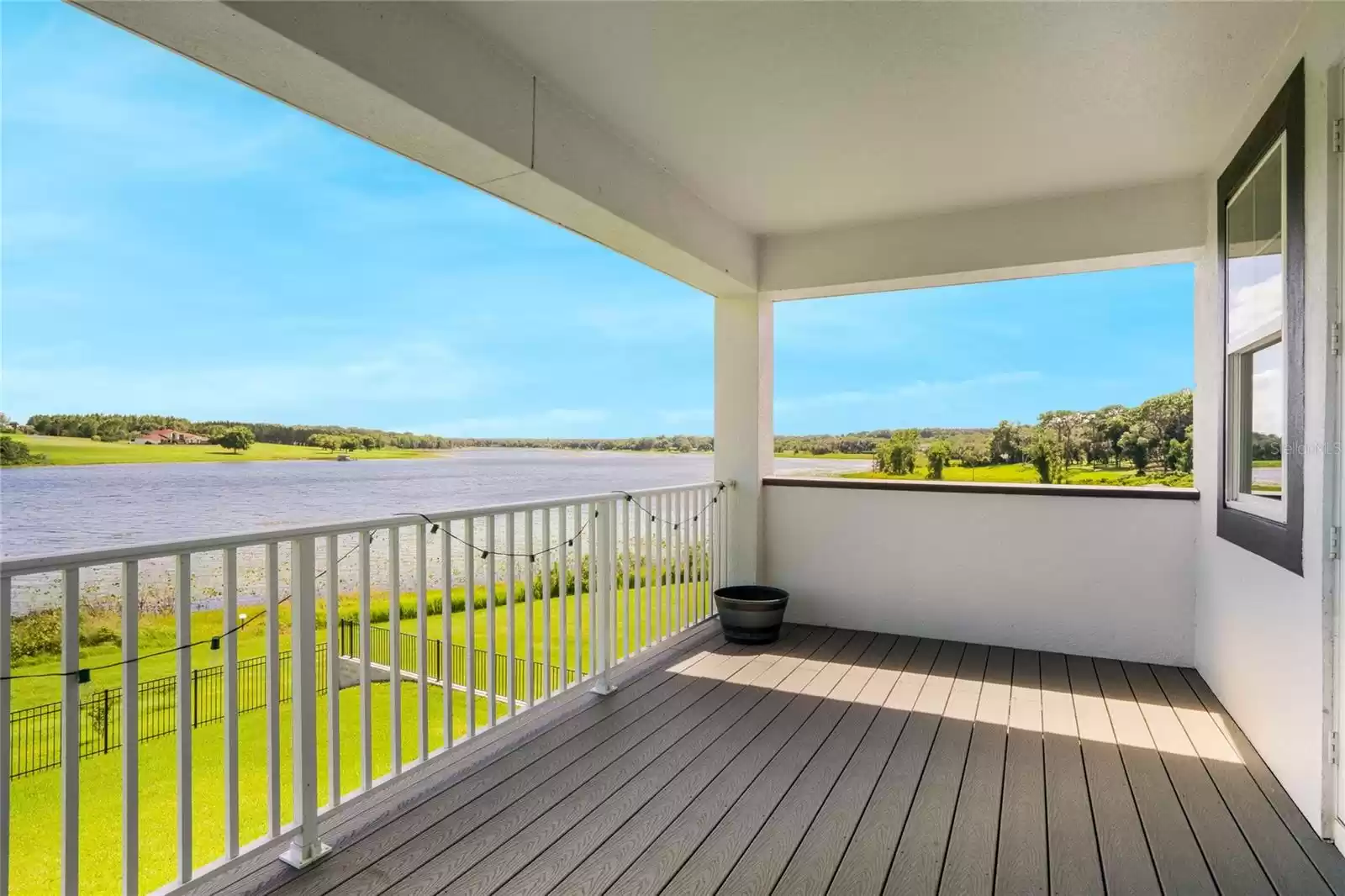 Huge balcony overlooking the lake makes for the perfect place to relax and unwind or start your day immersed in nature.