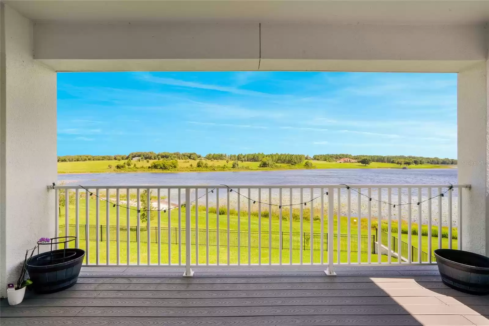 Huge balcony overlooking the lake makes for the perfect place to relax and unwind or start your day immersed in nature.