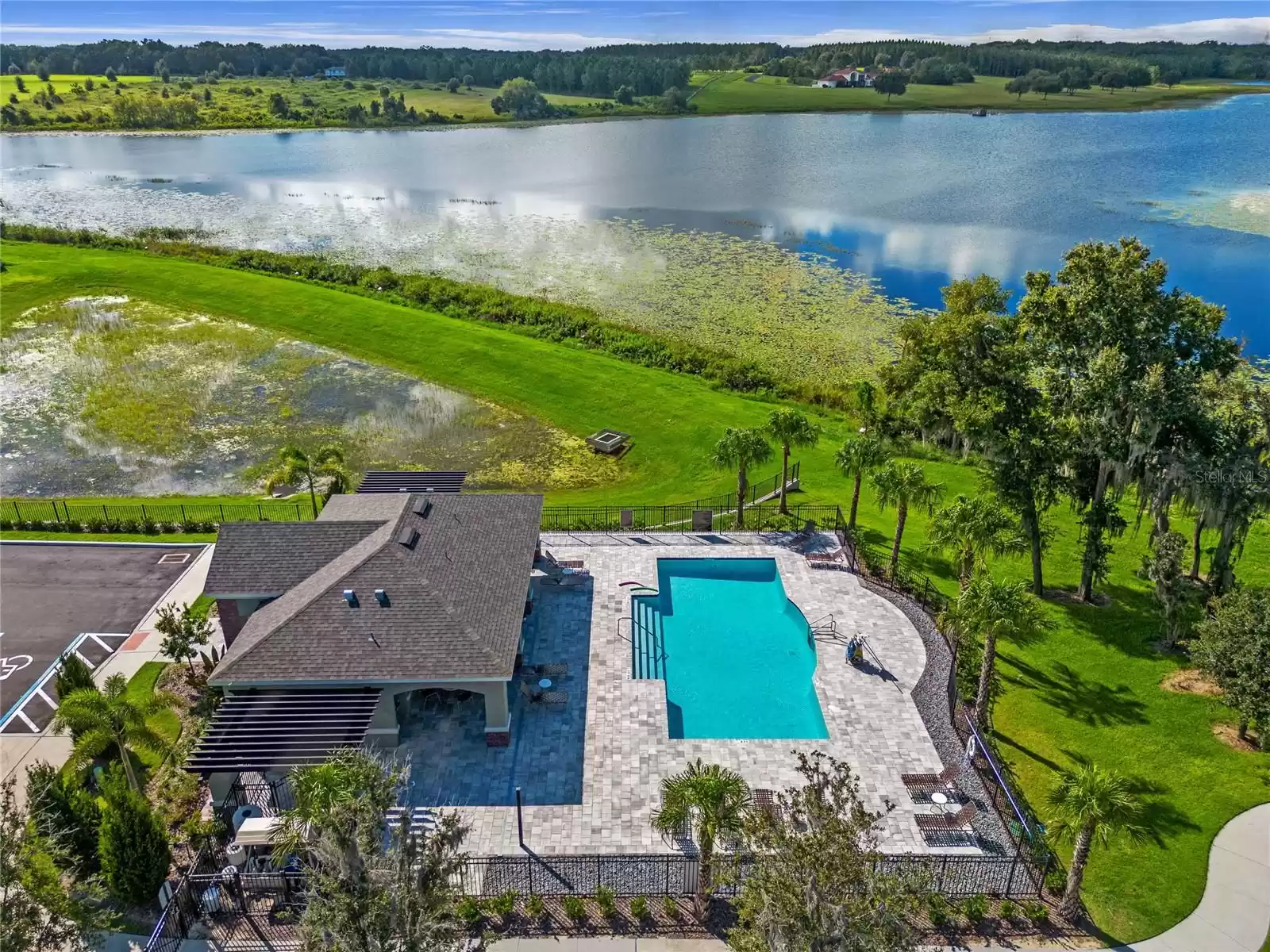 Enjoy the Community pool overlooking the lake