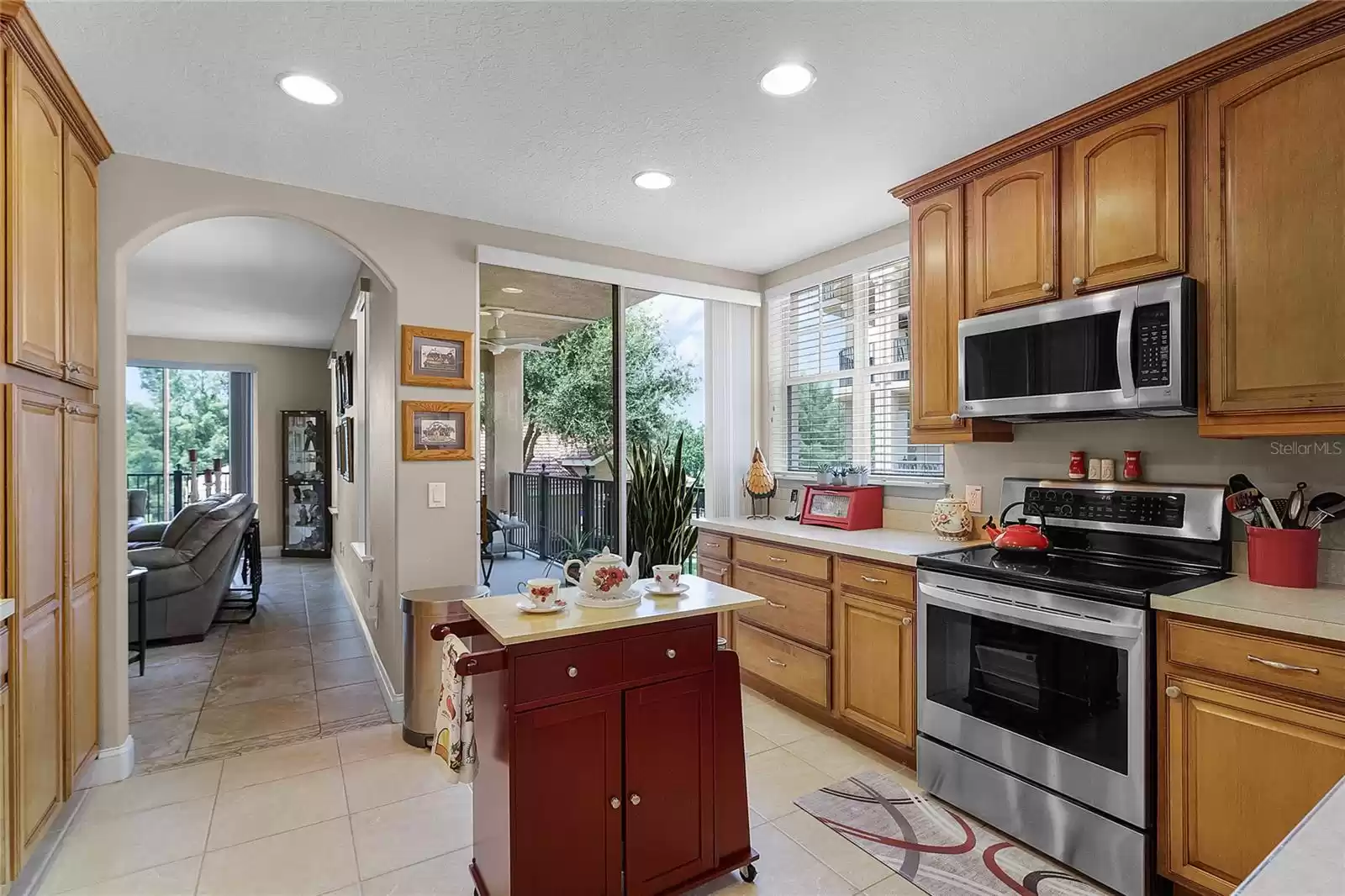 The kitchen is a chef's delight, featuring ample cabinet and counter space