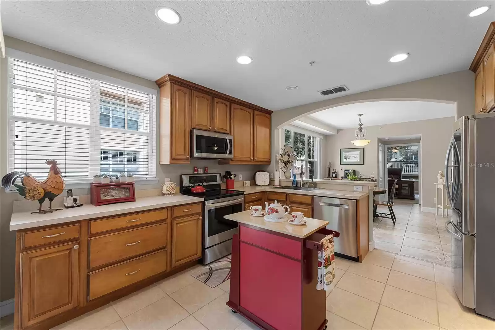 The kitchen is a chef's delight, featuring ample cabinet and counter space