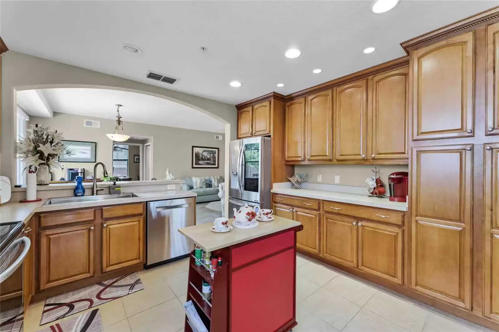 The kitchen is a chef's delight, featuring ample cabinet and counter space