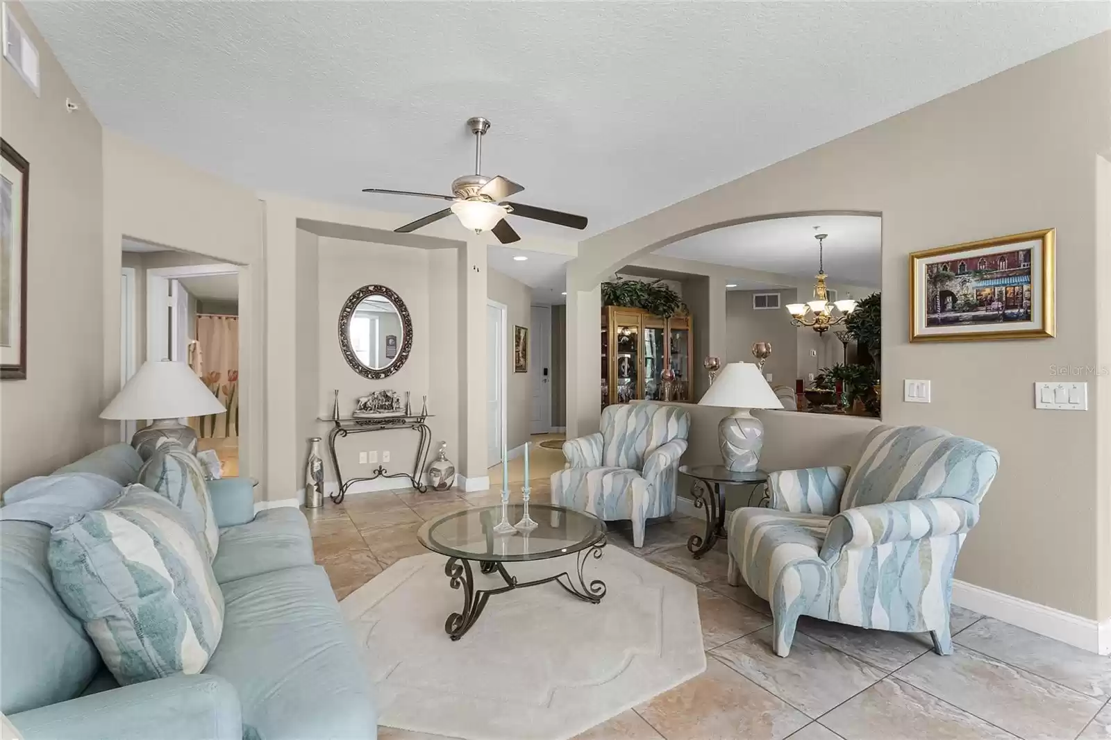 Spacious living room with ample natural light.