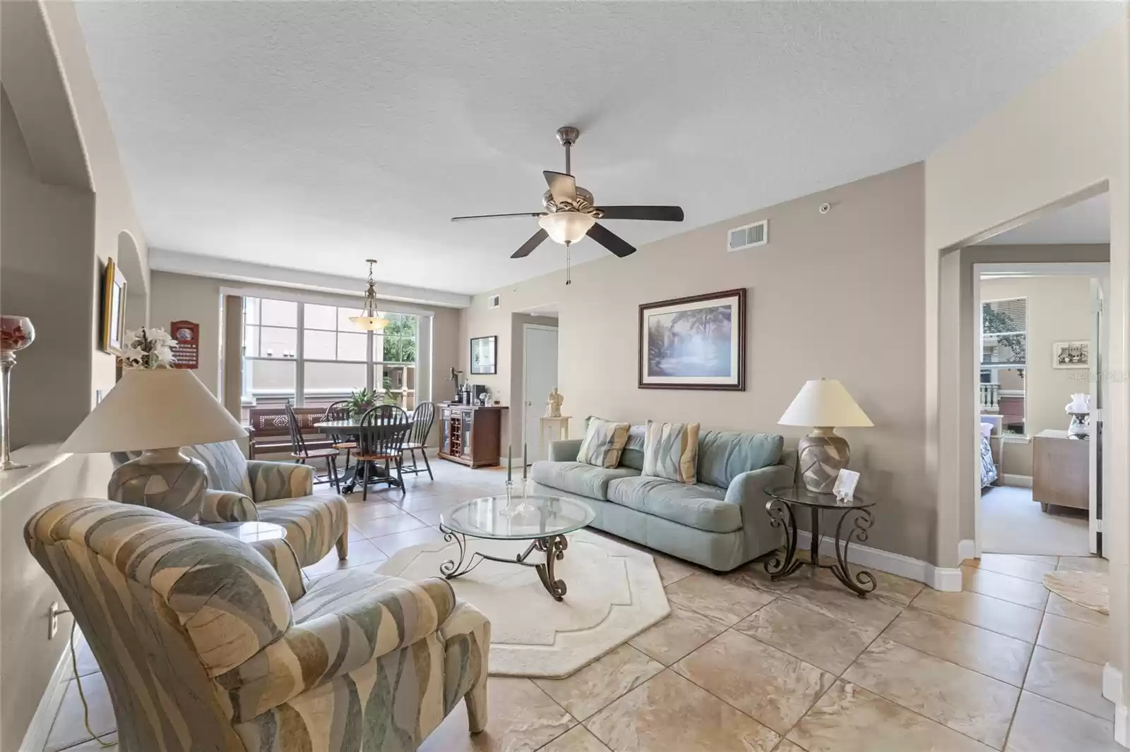 A dinette/breakfast nook is nestled in between the living room and kitchen.