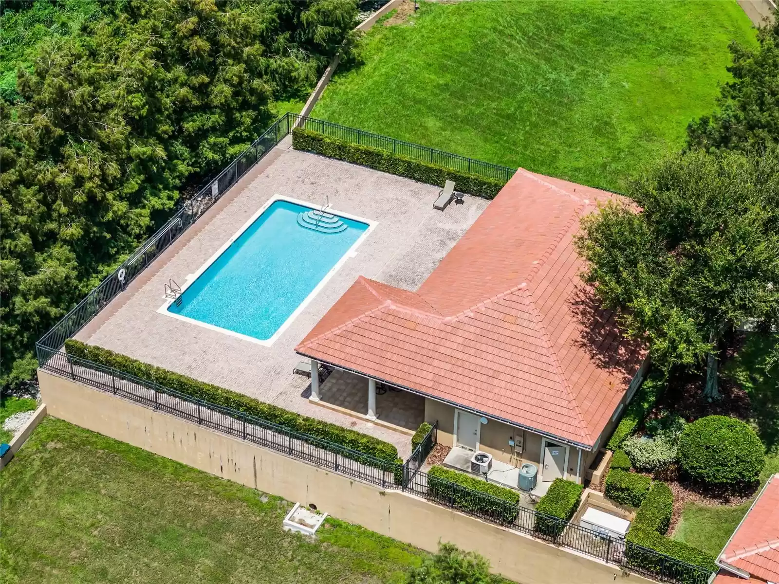 A short walk from this unit leads you to the community clubhouse and sparkling pool.