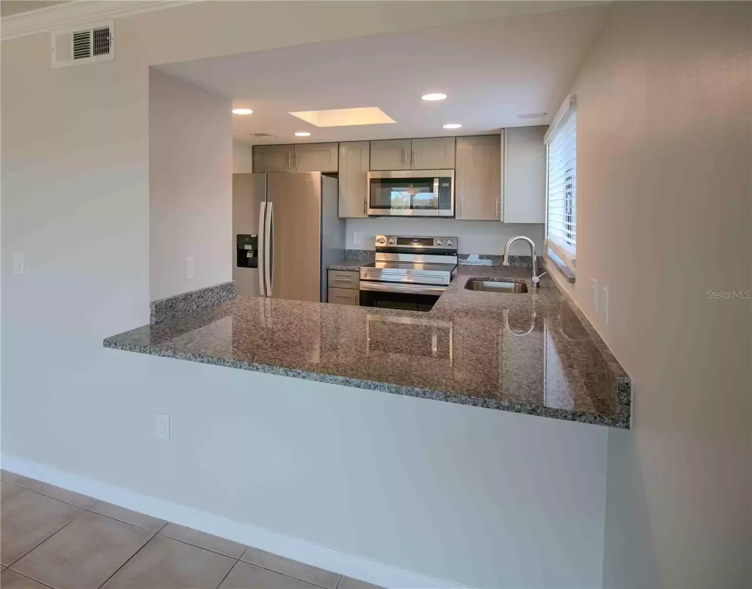 Kitchen from the living and dining area