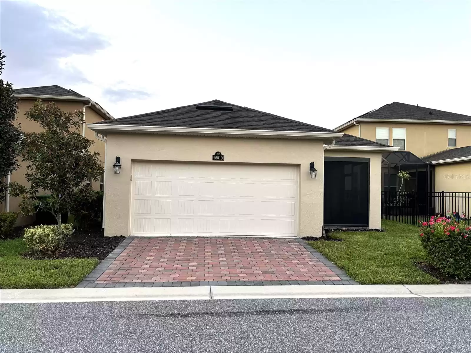 Rear Garage with Bricked Driveway