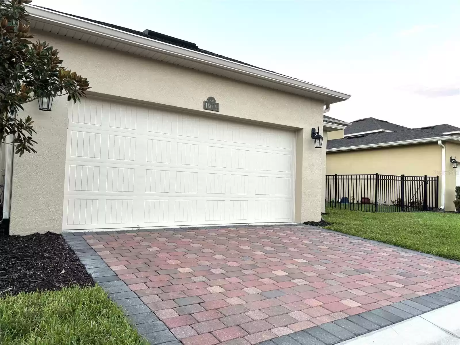 Rear Garage with Bricked Driveway