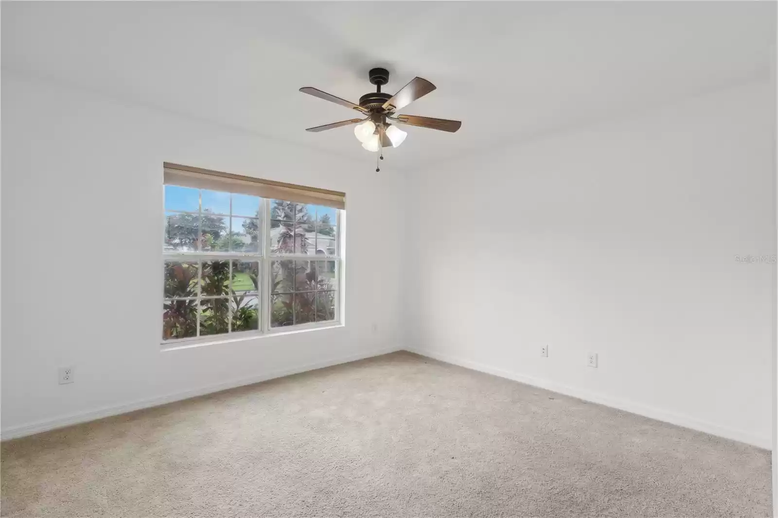 View of the front room, showcasing its abundance of natural light.