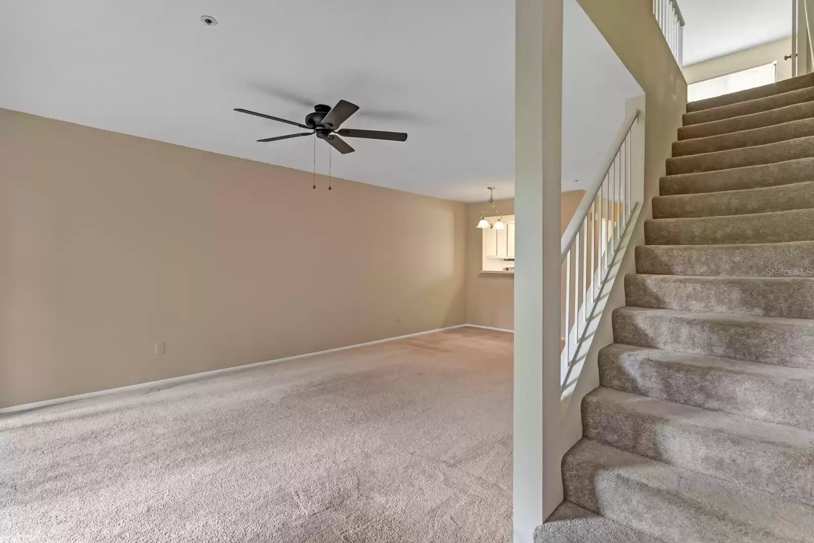 Living room and stairs to second floor