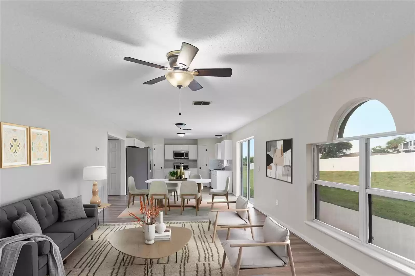 Virtually Satged- Family room opens up to Kitchen.