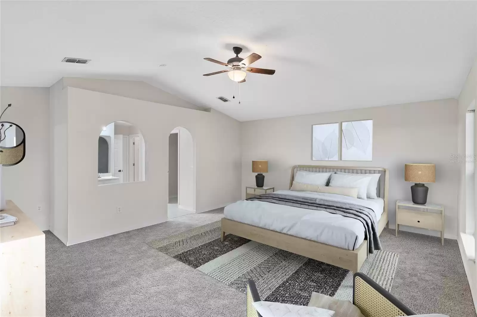 Virtually Staged- Primary Bedroom looking into Bathroom