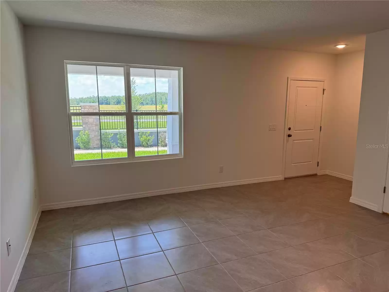 15104 WINDFLOWER ALLEY, WINTER GARDEN, Florida 34787, 3 Bedrooms Bedrooms, ,2 BathroomsBathrooms,Residential,For Sale,WINDFLOWER,MFRO6239135