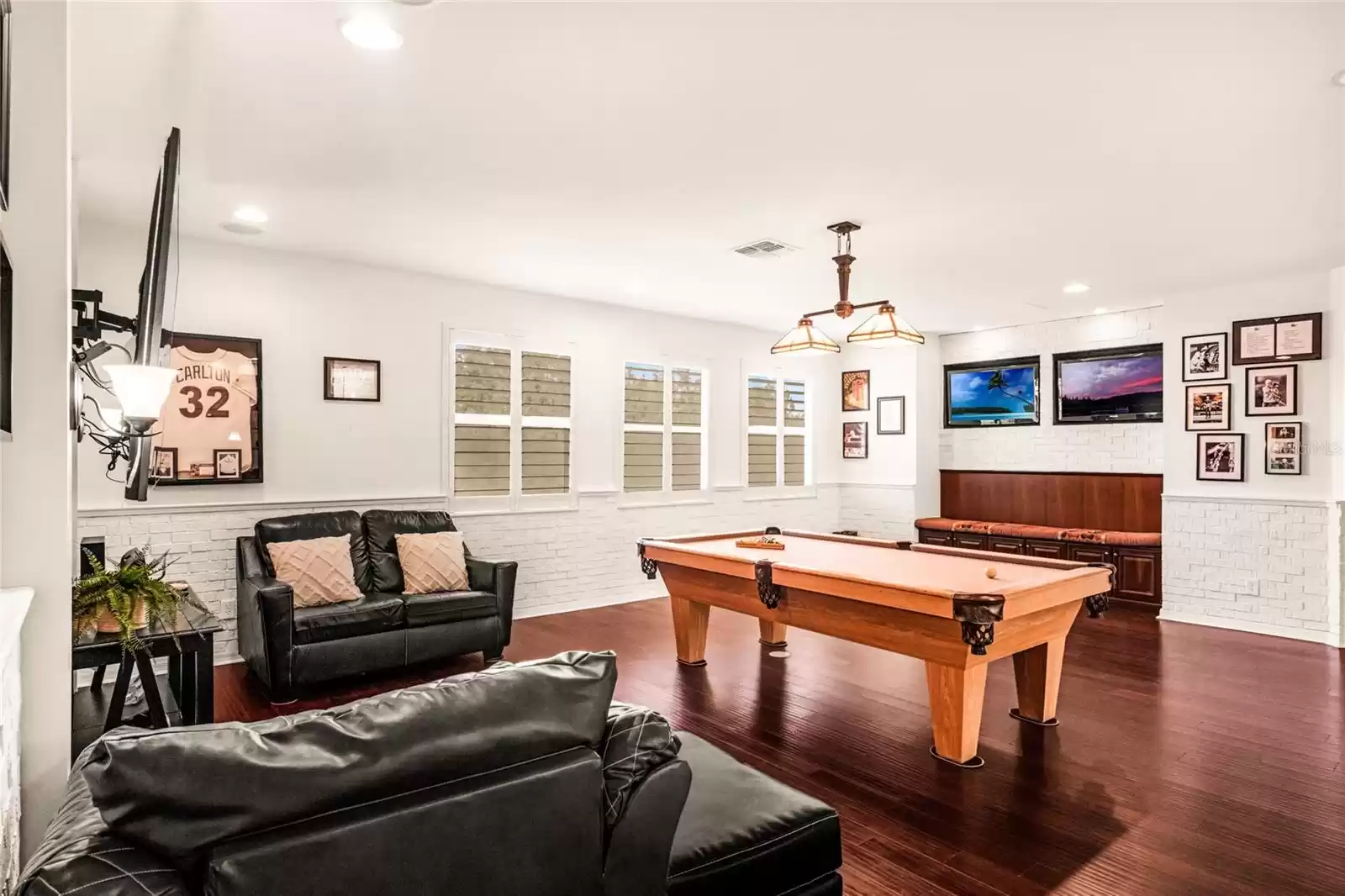 Game Room custom seating and brick walls