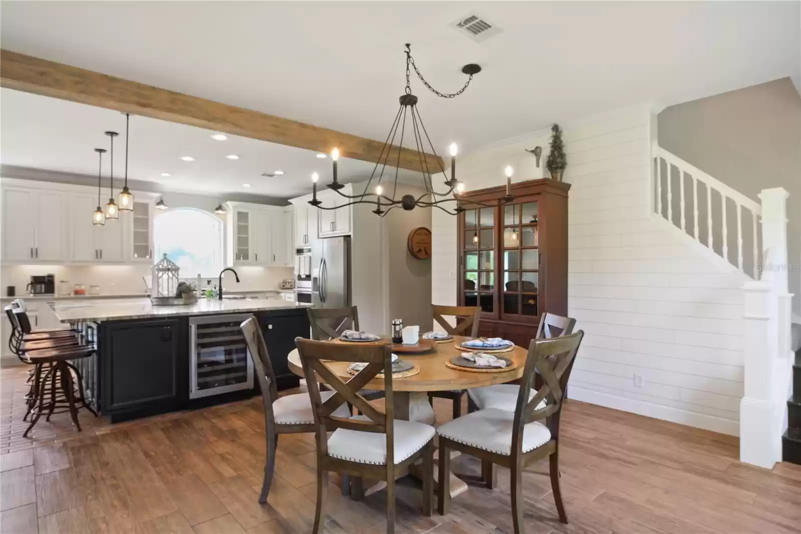 Dining Room with a wine refrigerator in the Island