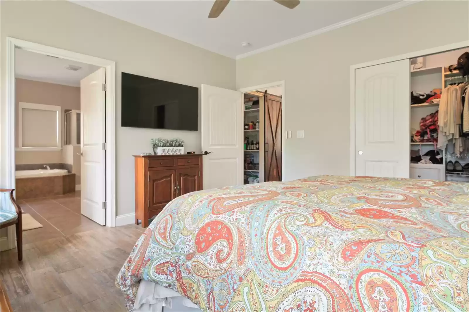 Primary Bedroom with a Walk-In Closet