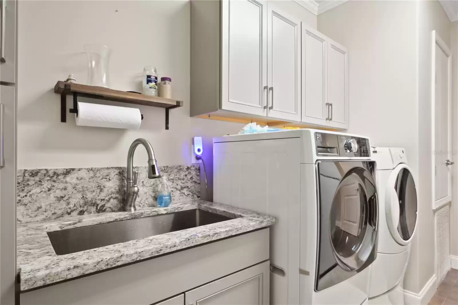 Laundry Room with Granite Counter Tops