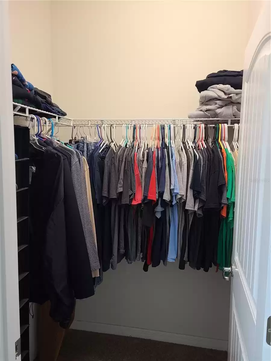 Primary Bedroom Walk-In Closet (smaller one of two)