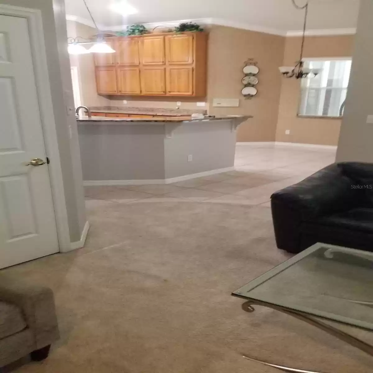 VIEW OF KITCHEN FROM FAMILY ROOM