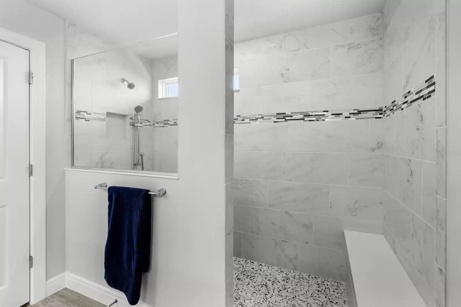 Super shower with tile to the ceilings