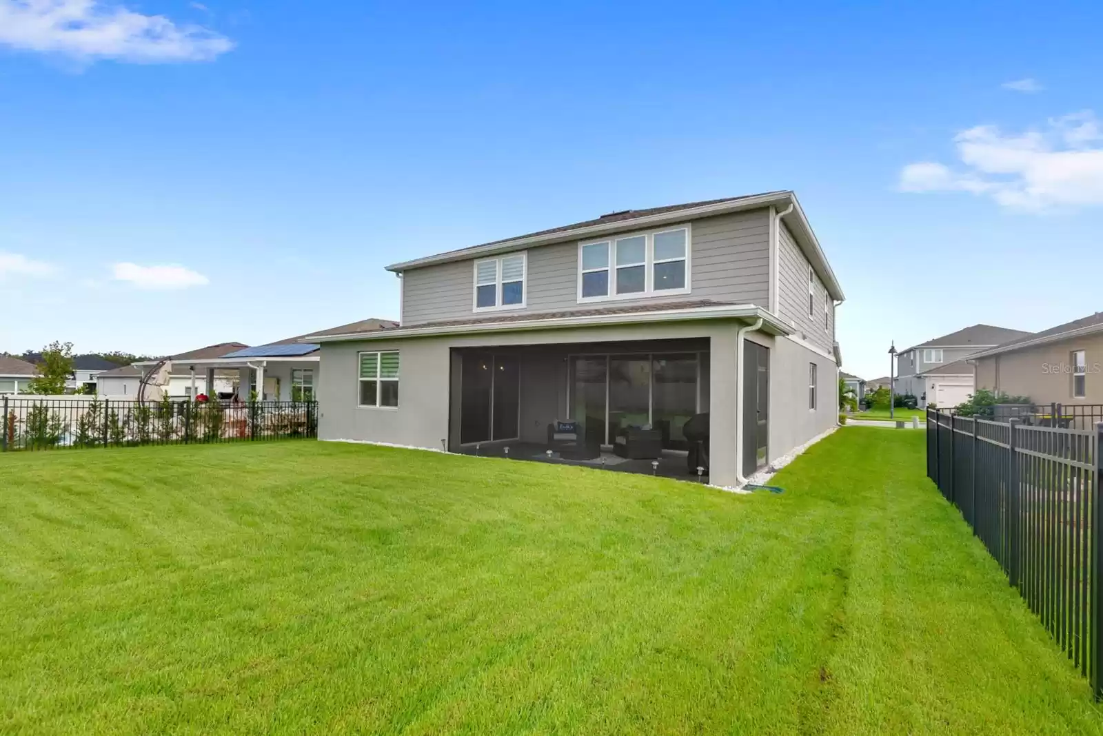 Large yard with screened in lanai